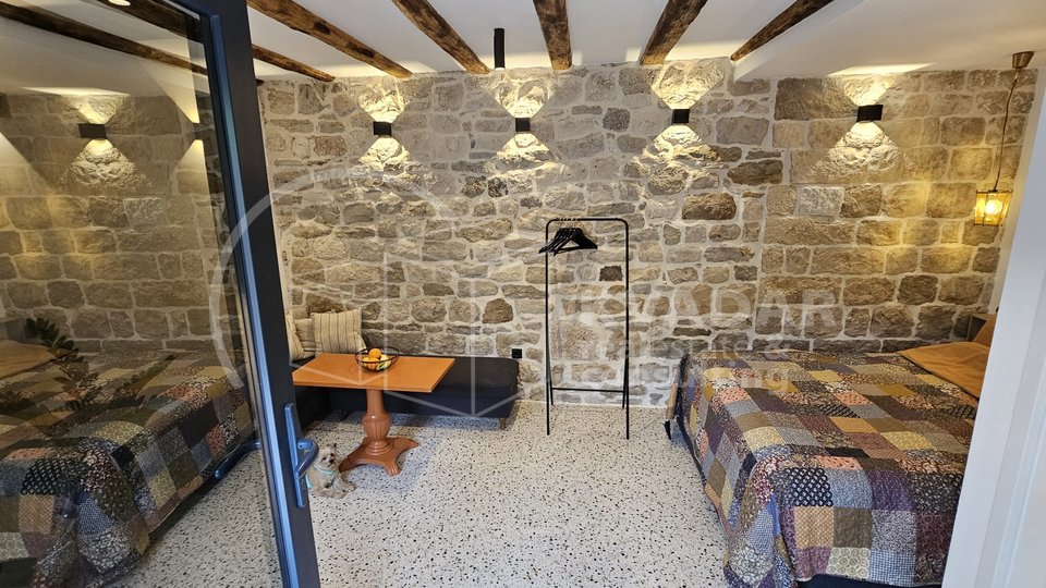 House in a row of tipical Kastela's small street -120m2 - completely renovated - 50m from the sea